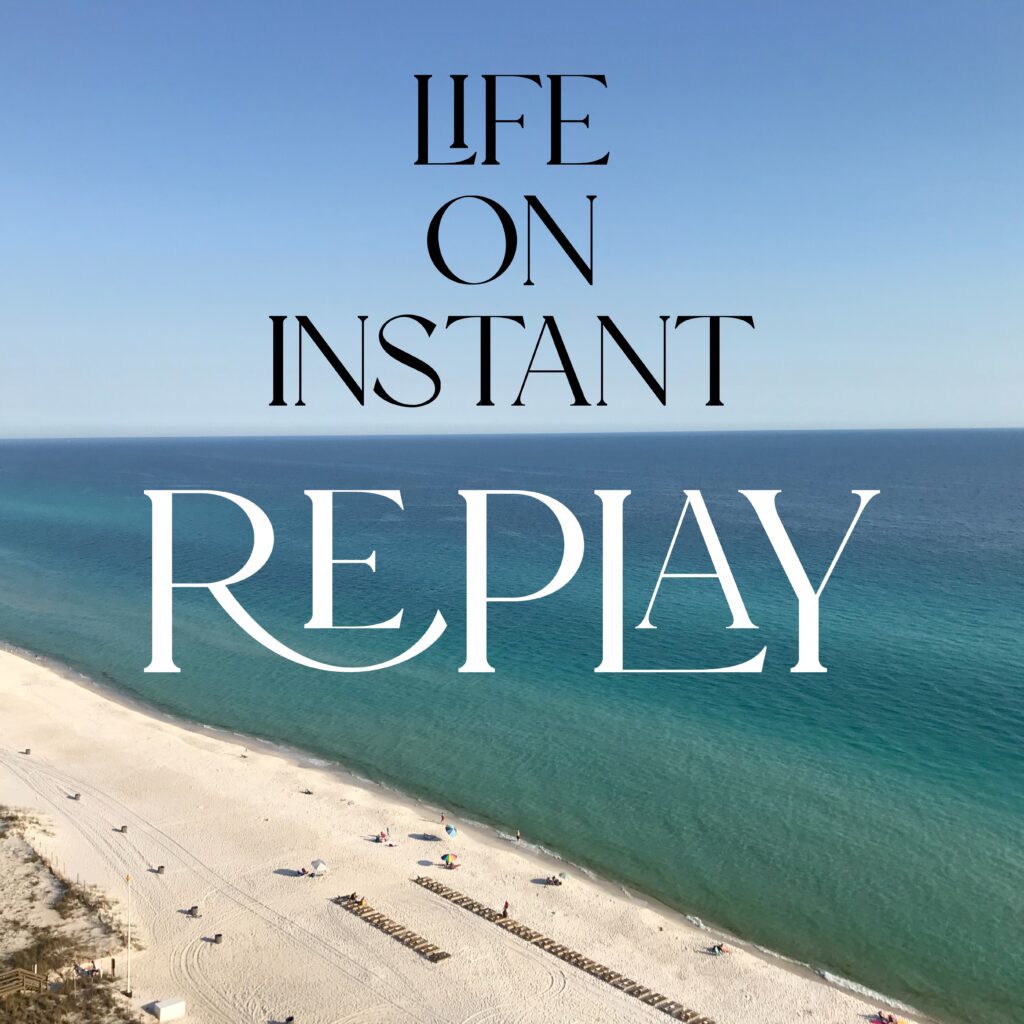 A beach with the words life on instant replay