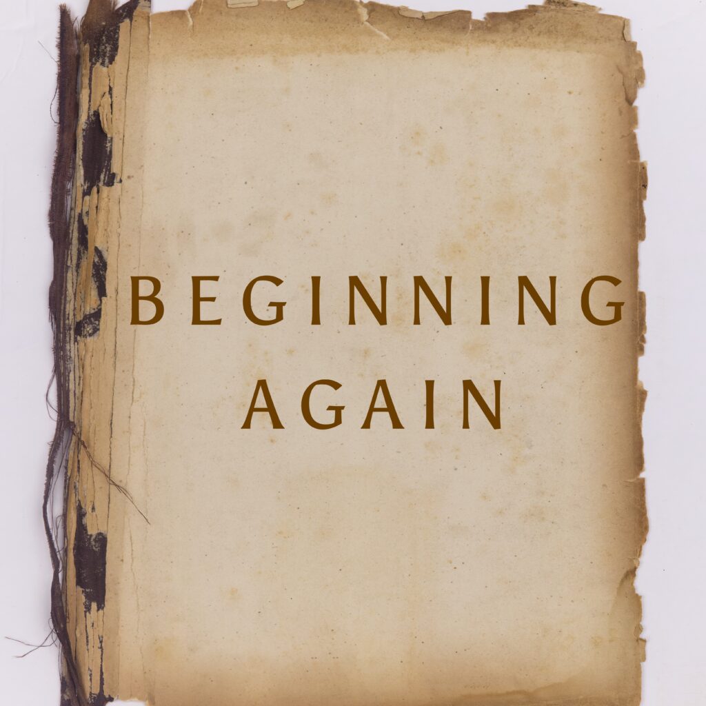 A book with the words beginning again on it.