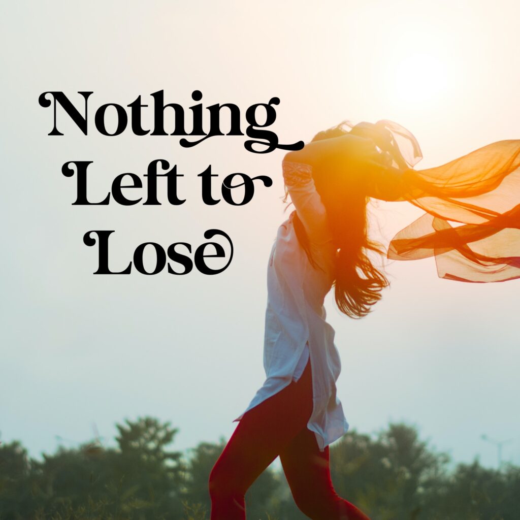 A woman is walking in the sun with her arms outstretched.