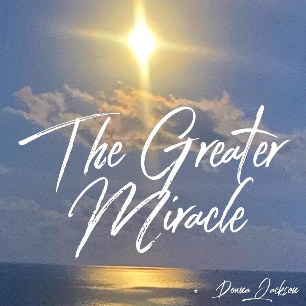 A sun shining on the ocean with the words " the greater miracle ".